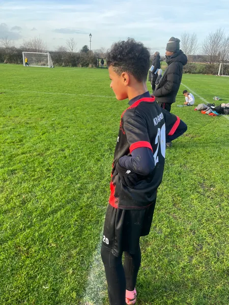 N10 Academy player on the pitch — integrity in action