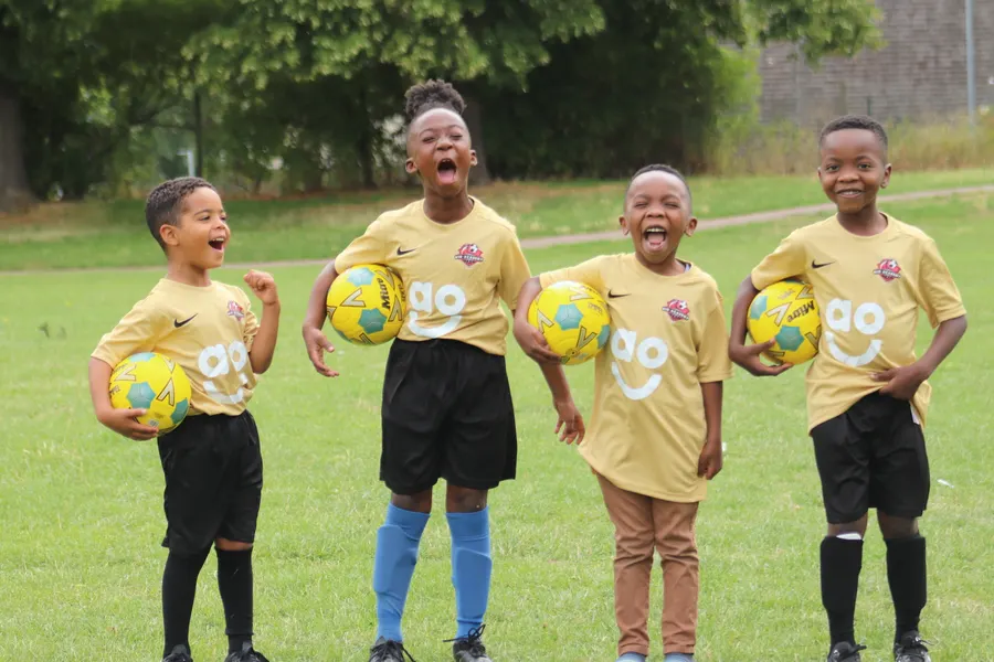 N10 Academy community — young players celebrating together